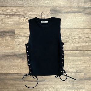 Zara knit, with laced sides and brass grommets.  Size M.